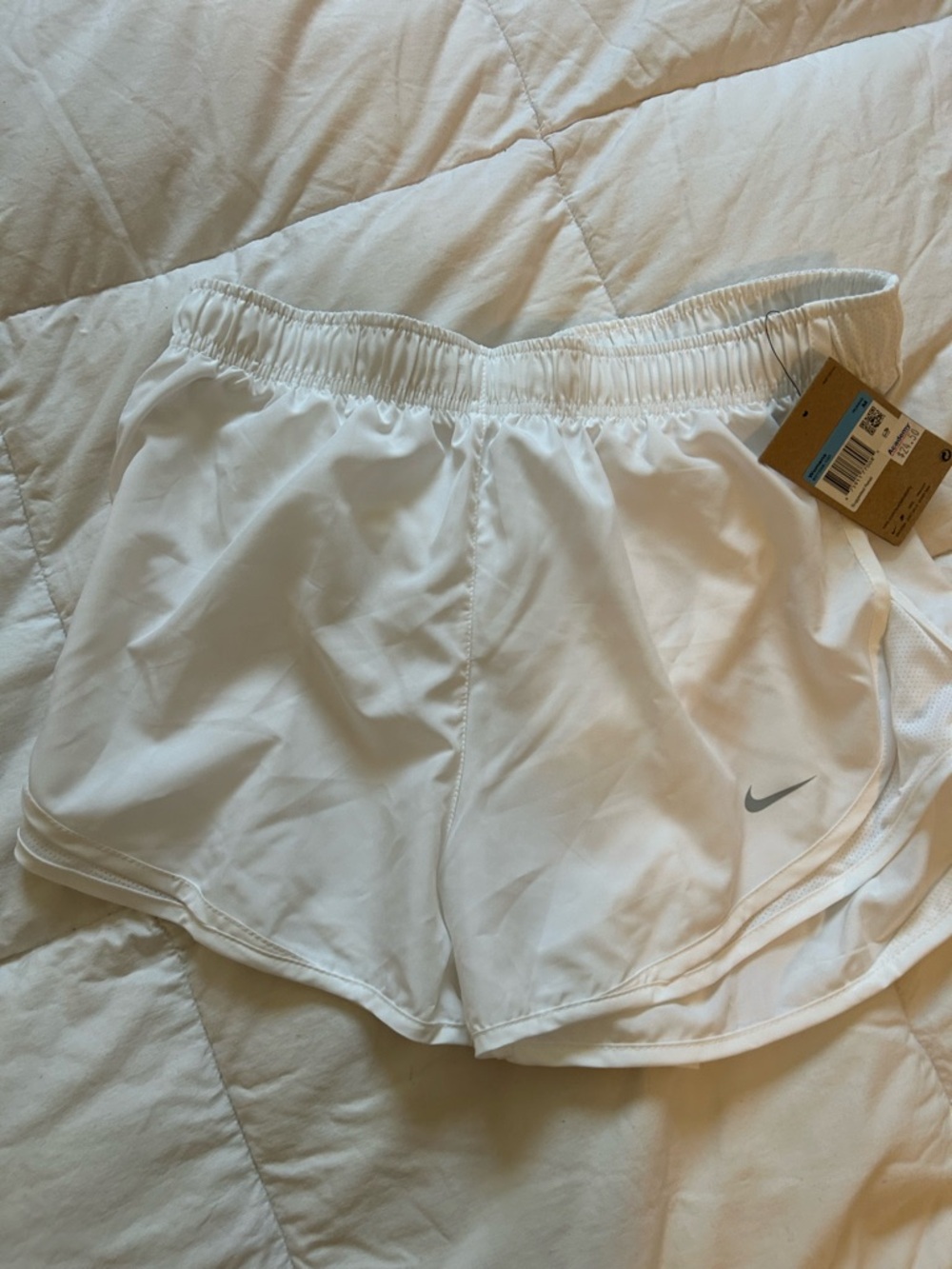 Nike Women’s White Athletic Running Shorts with Silver Swoosh
